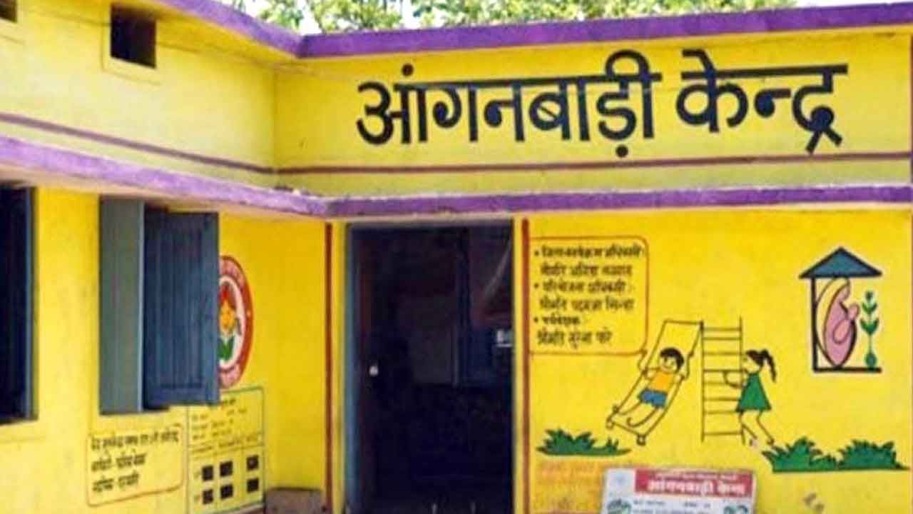 a yellow building with a sign on it